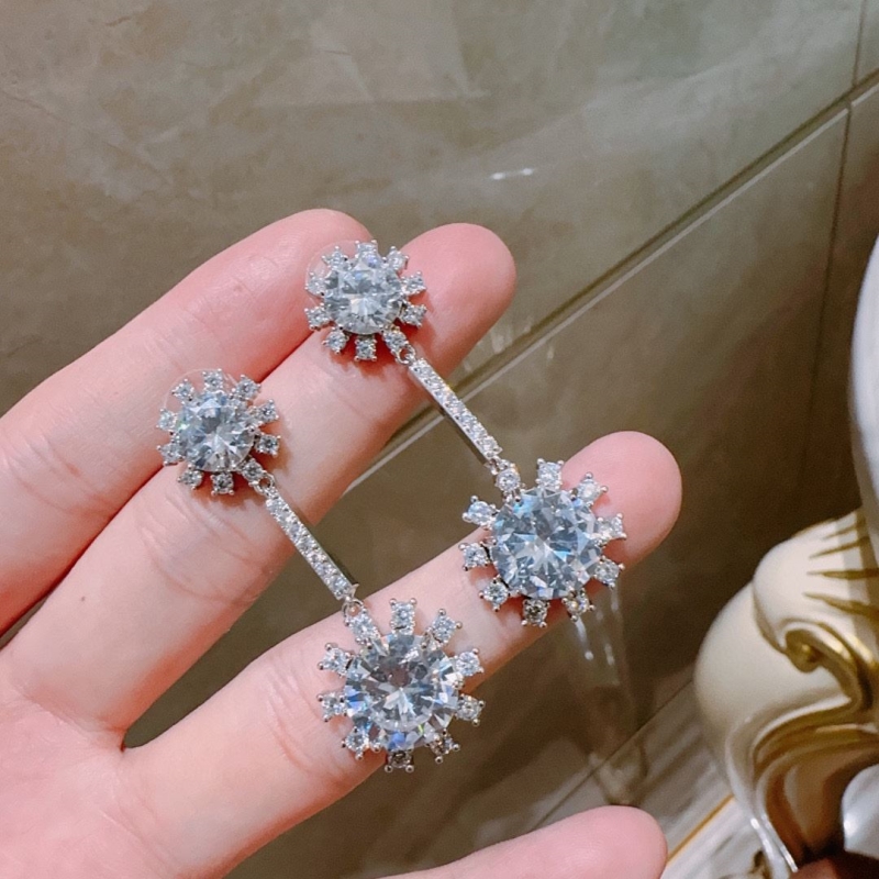 T*f*ny earrings